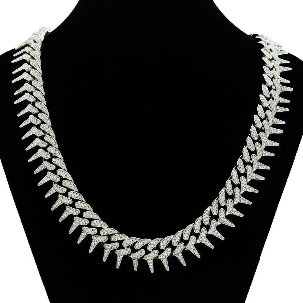 Gardira 19-inch Cuban chain necklace with full diamond rap thorn inlay, showcasing intricate diamond detailing and a bold style.