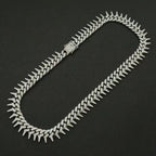 Gardira fully iced-out spiked thorn Cuban link bracelet with punk and hip-hop style, showcasing intricate design and sparkling embellishments.