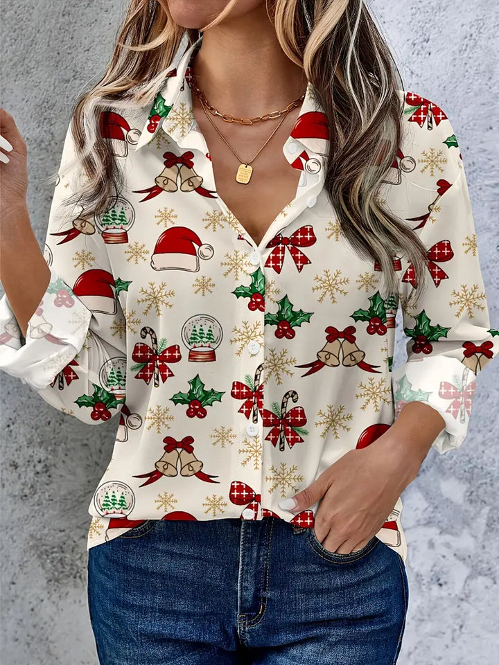 Woman wearing a festive patterned shirt with Christmas-themed designs on a gray background