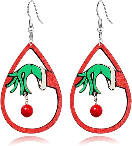 Teardrop-shaped earrings with green hands holding red balls on a white background