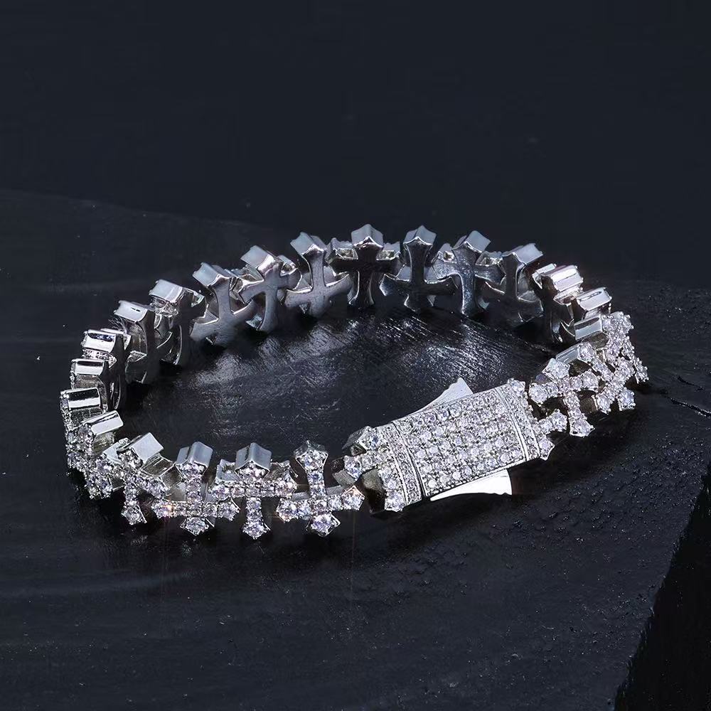 Gardira cross-shaped zirconia bracelet featuring sparkling stones and a sleek silver design, perfect for elegant wristwear.