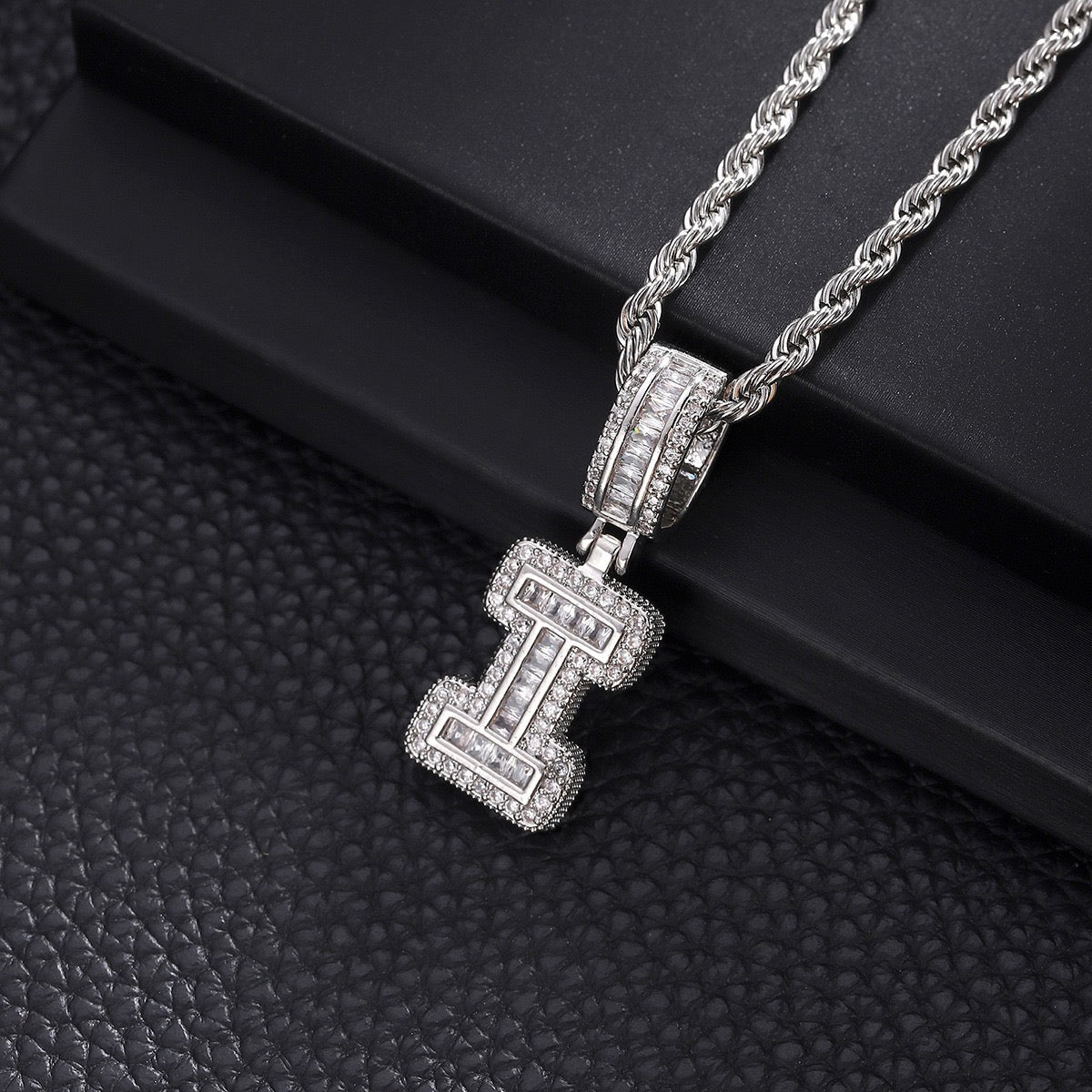 Custom iced out initial letter pendant necklace by Gardira featuring CZ diamonds, alphabet chain jewelry for men and women.
