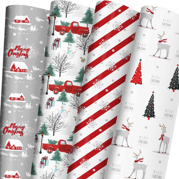 Collection of Christmas-themed wrapping paper rolls with various designs.