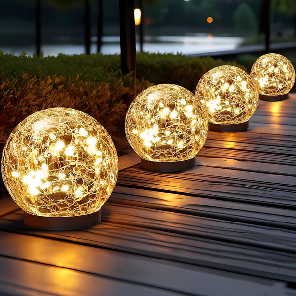 Decorative outdoor lights on a wooden deck with a blurred background