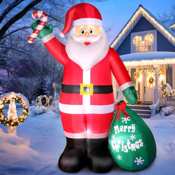 Inflatable Santa Claus decoration with a candy cane and 'Merry Christmas' bag in front of a house decorated for Christmas.