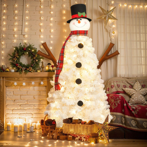 Decorative Christmas tree shaped like a snowman with lights in a cozy living room.
