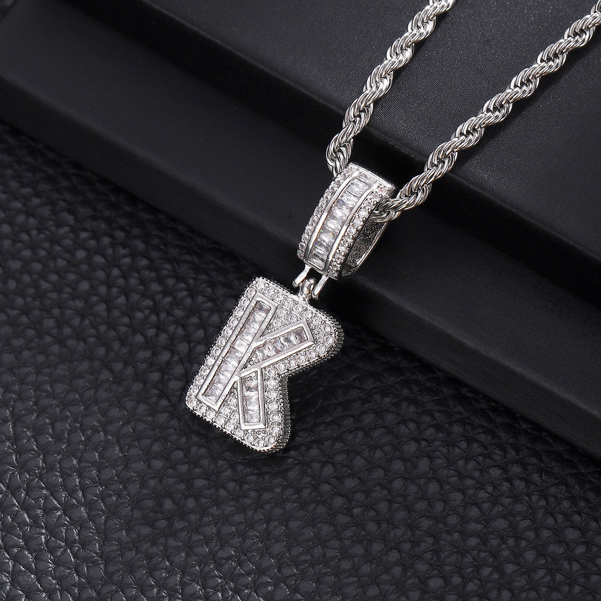Gold custom iced out initial letter pendant necklace with CZ diamonds by Gardira, featuring a hip hop alphabet chain for men and women.