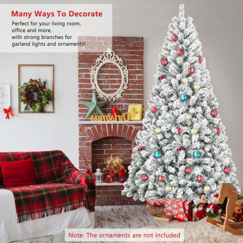 Decorative Christmas tree with ornaments in a living room setting.
