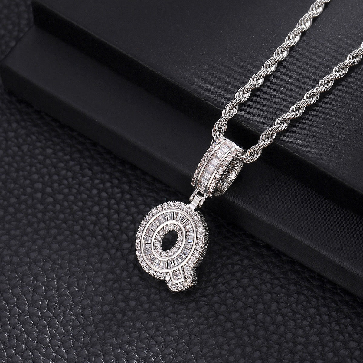 Gold custom iced out initial letter pendant necklace with CZ diamonds from Gardira, hip hop style alphabet chain for men and women.