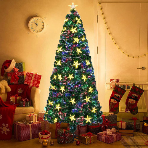 Decorated Christmas tree with lights in a living room setting.